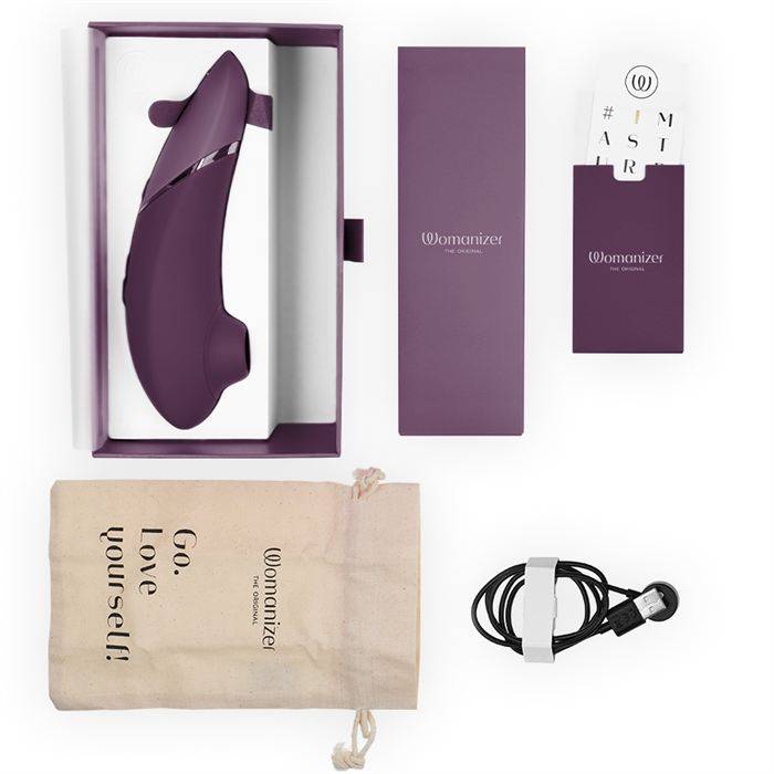 WOMANIZER - PRÃXIMO ESTIMULADOR CLITORIAL ROXO ESCURO